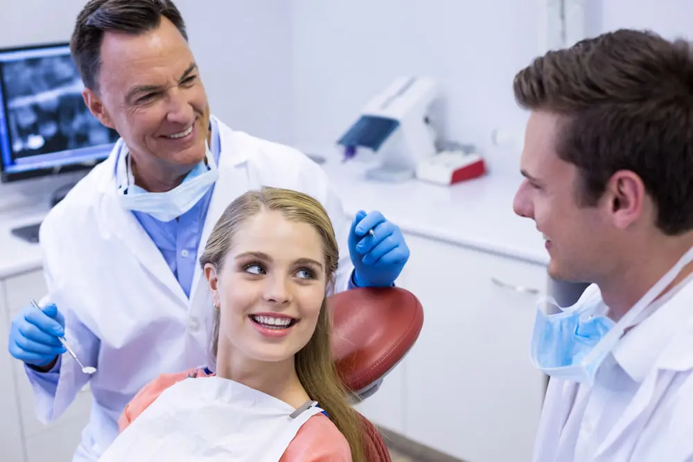 Orthodontist in Austin and Houston explaining how a palate expander works using illustrations and dental models.
