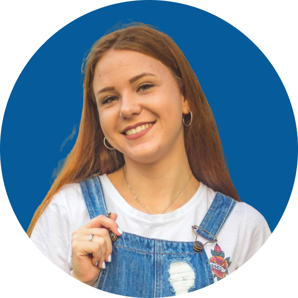 Smiling woman receiving specialized orthodontic treatment and jaw surgery to improve jaw alignment
