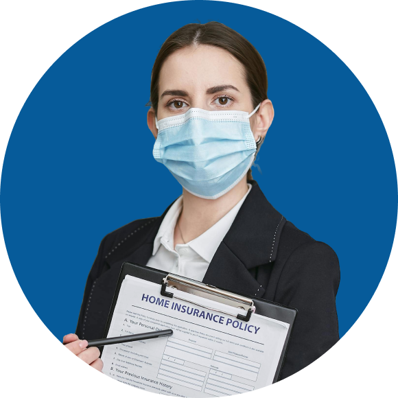 Person wearing a face mask holds a clipboard with a home insurance policy form against a blue background.