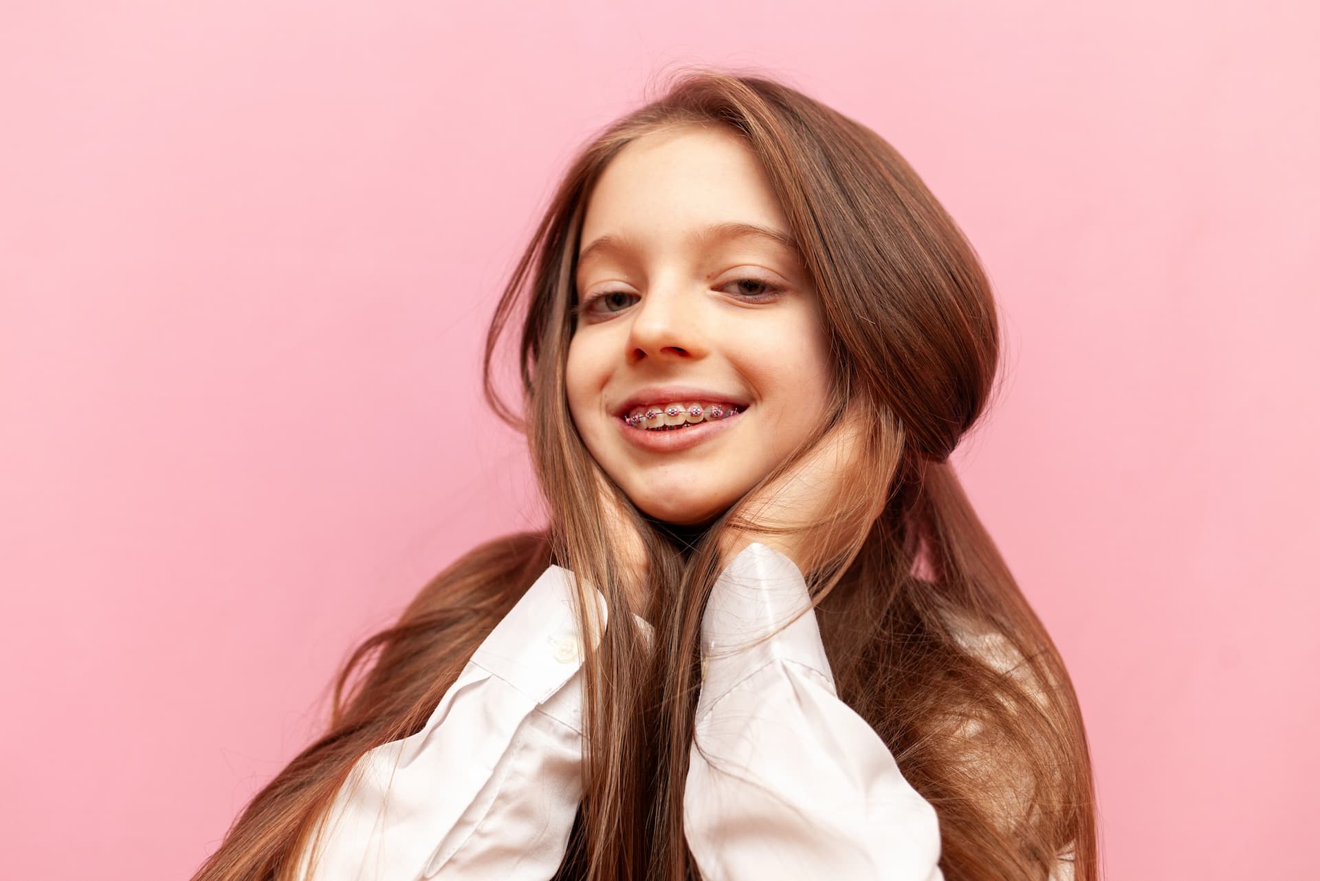 Teenager smiling while getting a consultation for braces near me in Austin and Houston, TX