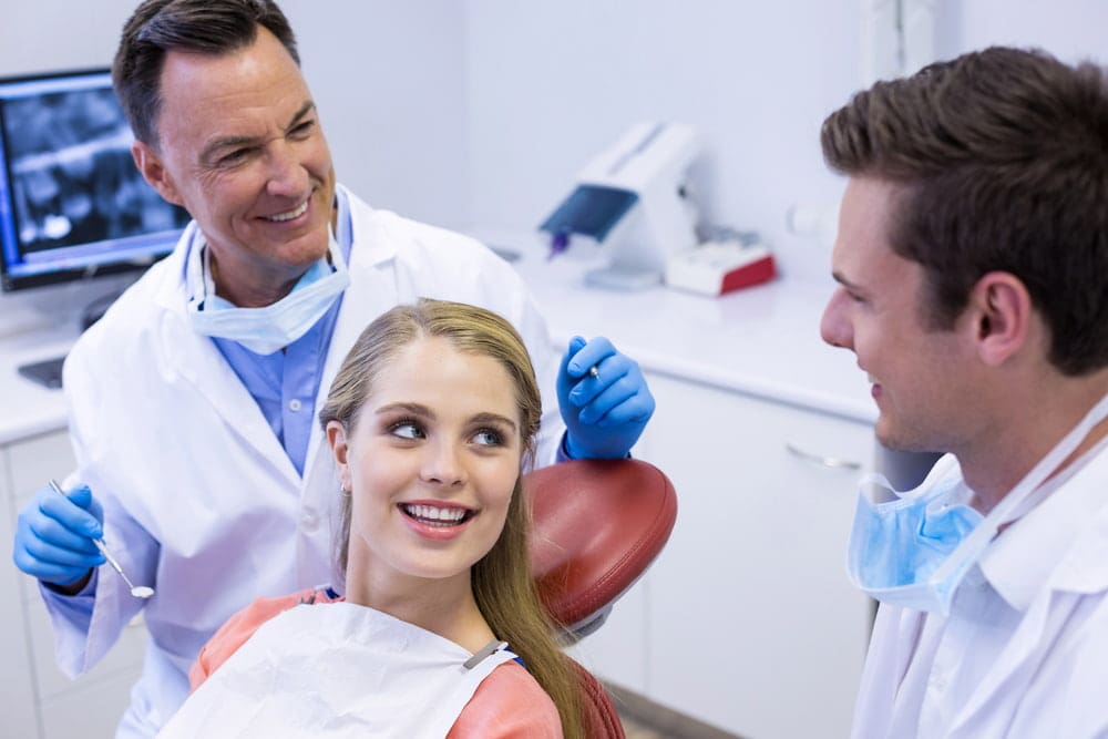 Orthodontist in Austin and Houston explaining how a palate expander works using illustrations and dental models.