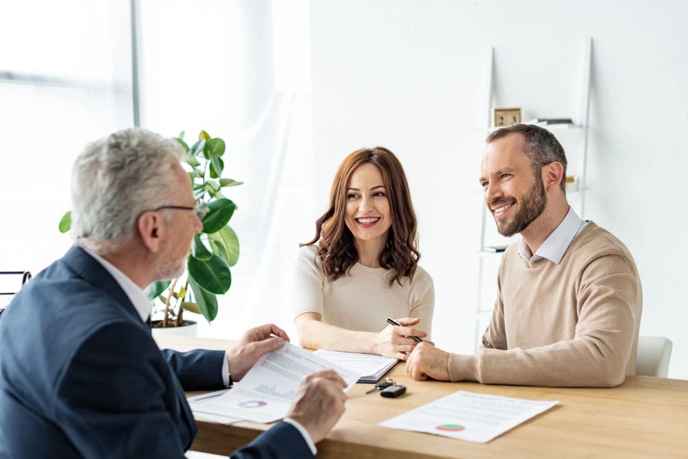 Doctor showing Invisalign cost breakdown and flexible payment plans to patients